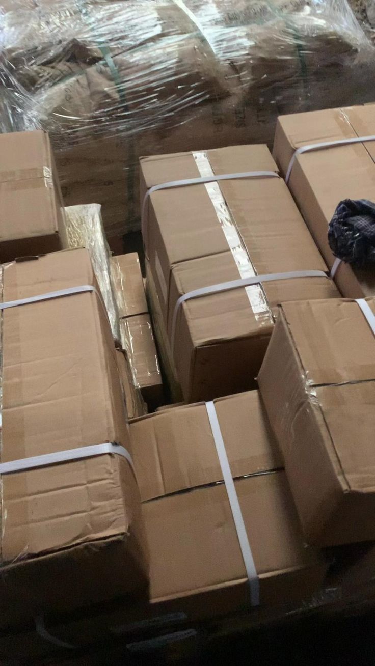 Strapped cartons ready for industrial export packing